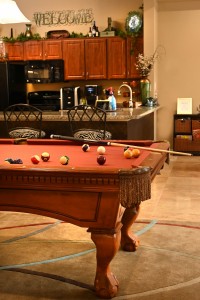 Apartments in Jersey Village, Texas - Clubroom Pool Table with View to Kitchen   